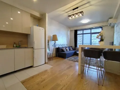 Modern living room with kitchen and dining area. - image 6