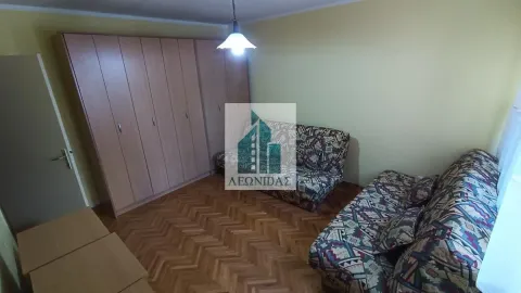 Furnished bedroom with a large wardrobe and two beds. - image 7