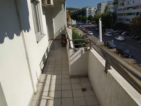 A long balcony overlooking the street. - image 13