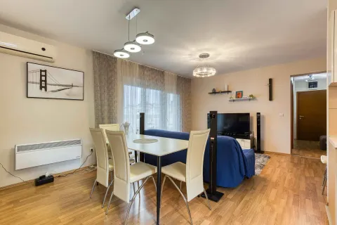 Living room with dining area and sofa. - image 4