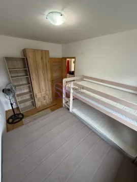 Bedroom with a bunk bed, wardrobe and bookshelf. - image 10