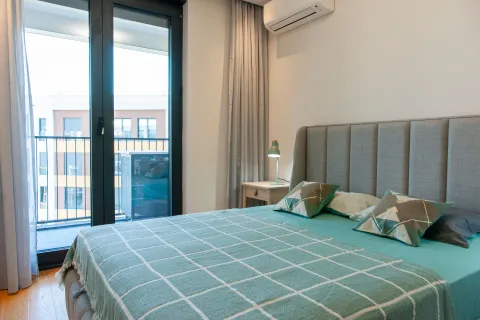 Furnished bedroom with a double bed and access to the terrace. - image 17
