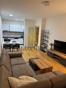 Living room connected to the kitchen and dining area. - image 7