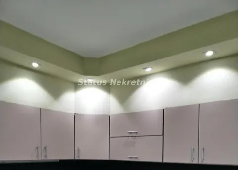 Upper kitchen cabinets with built-in ceiling lighting. - image 13