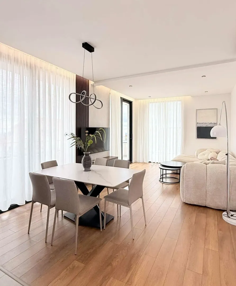 Spacious living room with a dining area and modern furniture.