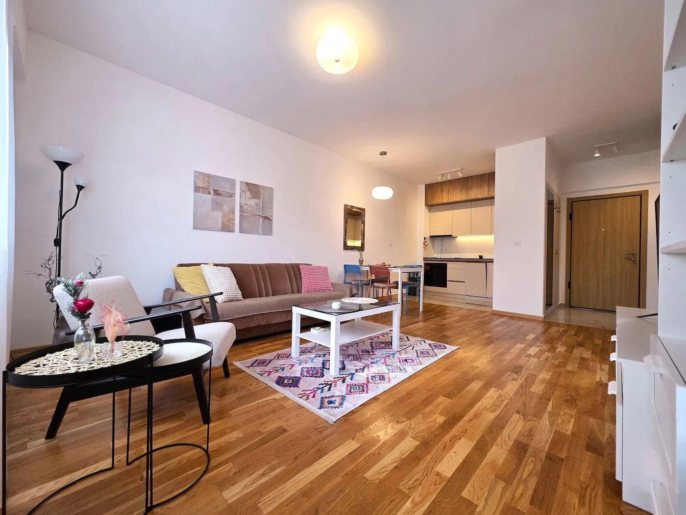 Spacious living room connected to the dining area and kitchen.