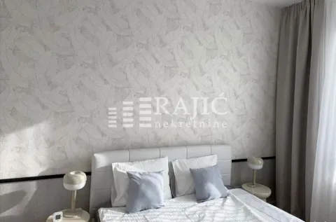 Furnished bedroom with a double bed. - image 8