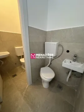 View of a modern bathroom equipped with sanitary fixtures. - image 5