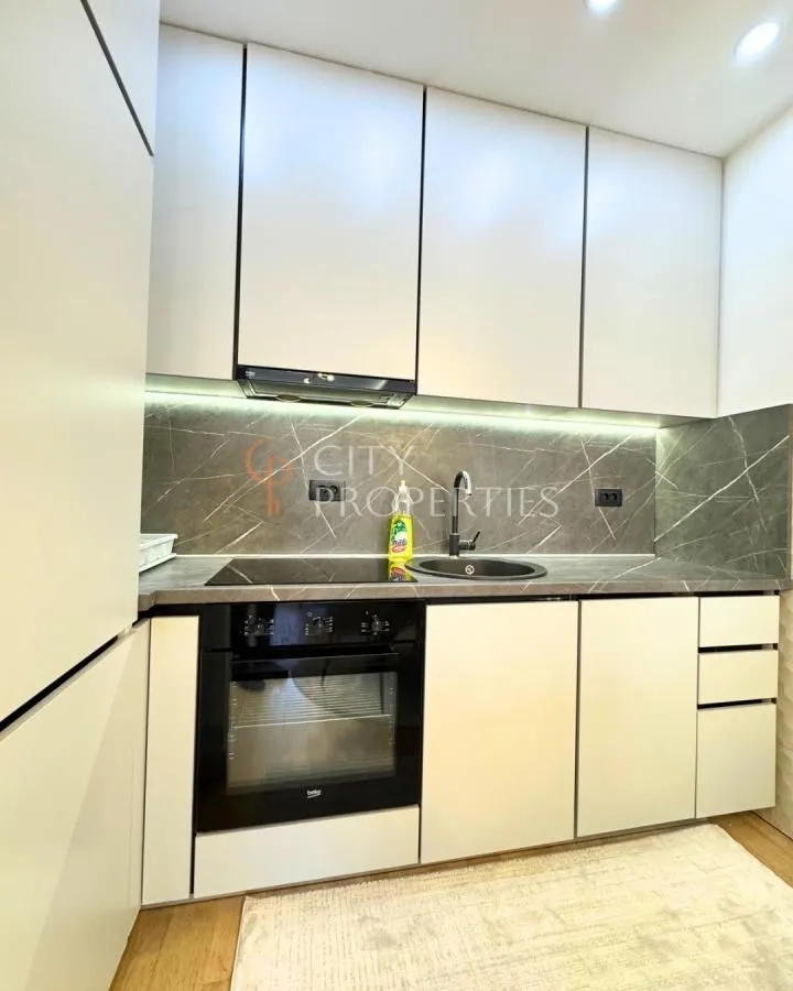 Modern kitchen with built-in units and appliances.
