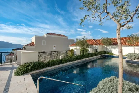 View of the outdoor swimming pool with a terrace and sea view. - image 10