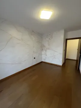 Bright empty room with a decorative wall. - image 6