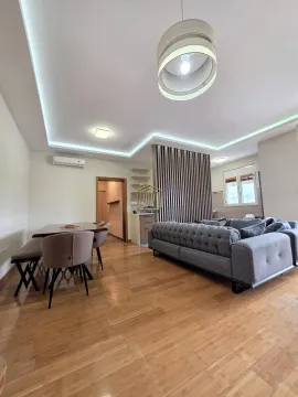 Spacious living room with sofa set and dining area. - image 24