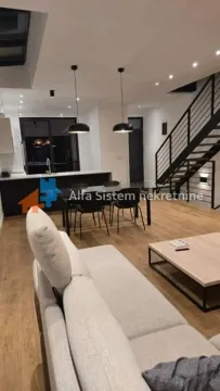 Dnevni boravak sa trpezarijom i stepeništem u modernom enterijeru. - image 3