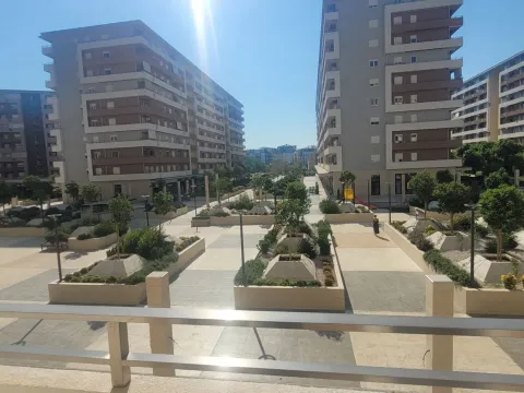 View from the terrace overlooking the landscaped plateau between residential buildings. - image 2