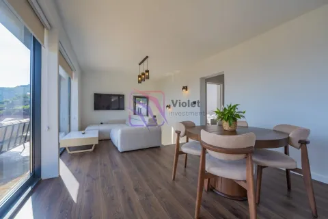 Living room with dining area and access to the terrace. - image 23