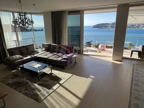 Spacious living room with a sofa set and a sea view. - image 5