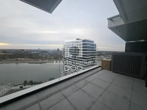 View of the river and surrounding buildings from the spacious terrace. - image 18