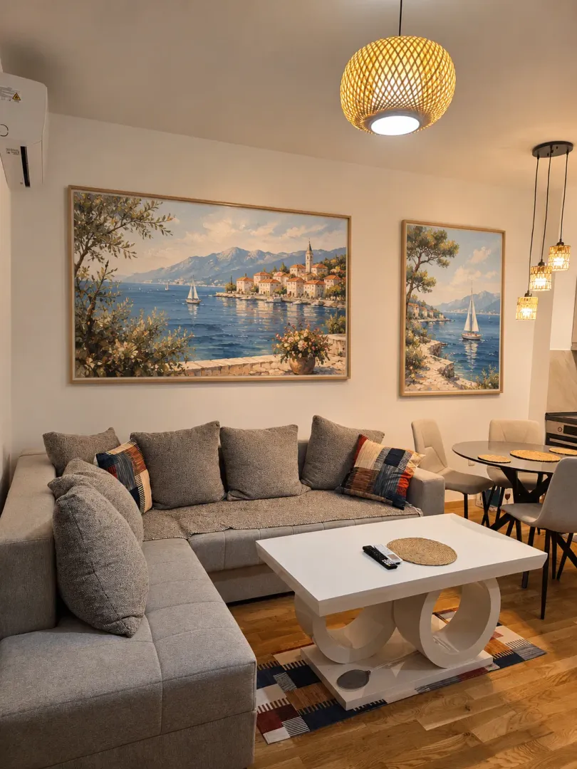 Comfortable living room with a sectional sofa, coffee table, and dining area.