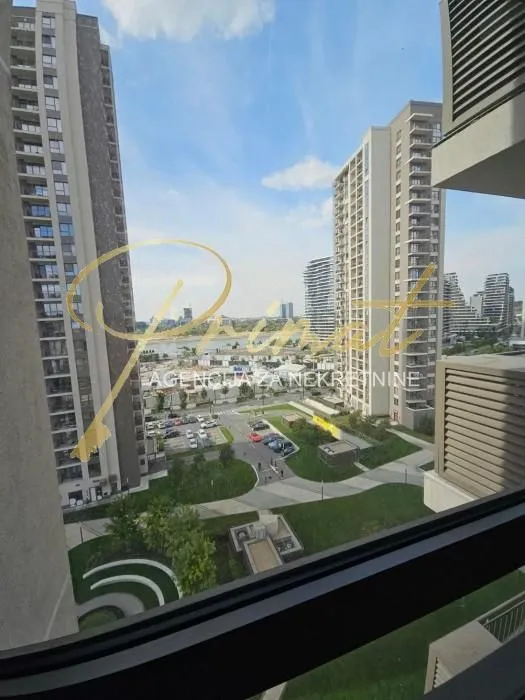View from the window overlooking surrounding buildings and the neighborhood.