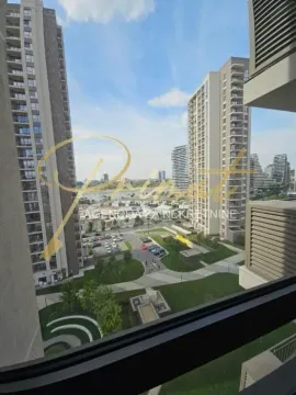 View from the window overlooking surrounding buildings and the neighborhood. - image 10