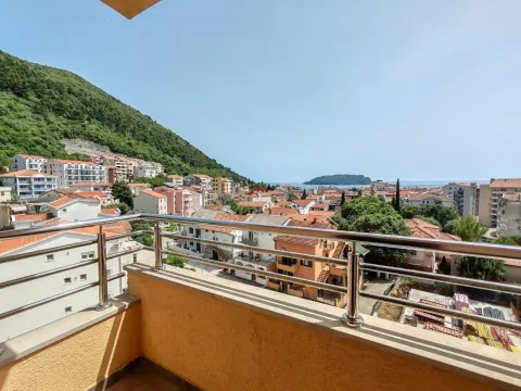 View from the balcony overlooking the town, hill and sea. - image 10