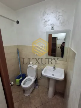 Small bathroom with toilet and washbasin. - image 6