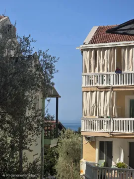Pogled na spoljašnjost zgrade sa terasama i djelimičnim pogledom na more. - image 14