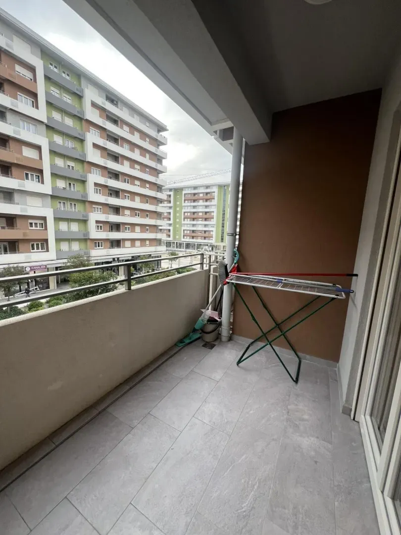Terrace overlooking neighboring buildings.