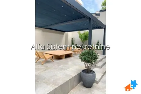 Courtyard with a terrace, seating furniture and a canopy. - image 10