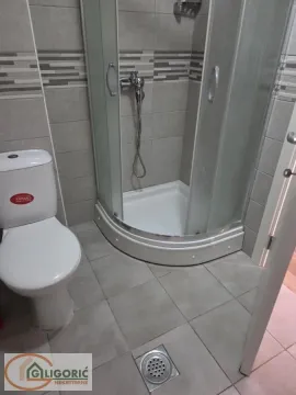 Bathroom equipped with a shower cabin and sanitary ware. - image 13