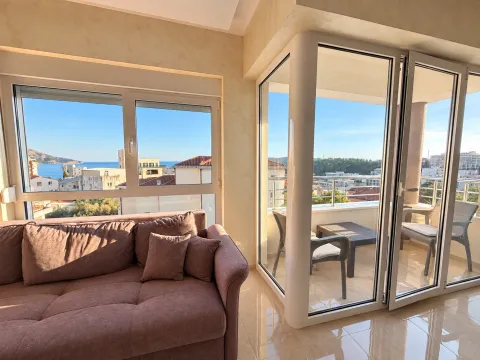 Living room with sofa and sea view. - image 2