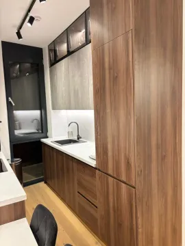 Modern kitchen with wooden elements and built-in lighting. - image 4