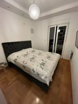 Bedroom with a double bed and access to the terrace. - image 7