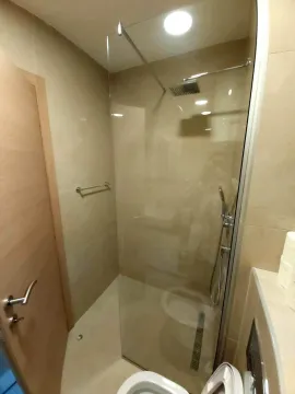 Modern shower with a glass screen in the bathroom. - image 4