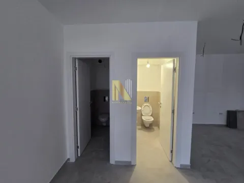 View of two toilets in a new apartment. - image 15