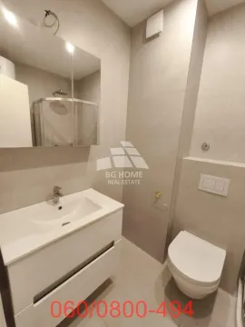 Moderno opremljeno kupatilo sa umivaonikom, toaletom i tuš kabinom. - image 8