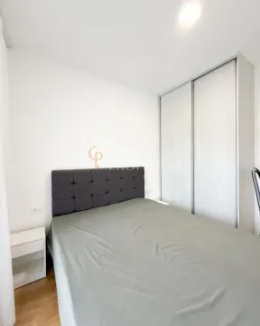 Bedroom with a double bed and a built-in wardrobe. - image 10