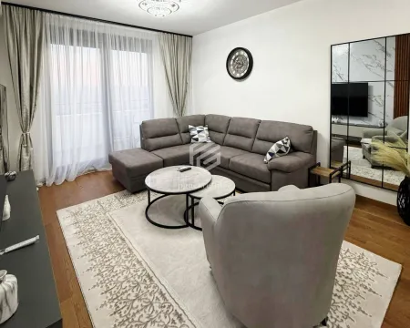 Dnevna soba sa ugaonom garniturom, foteljom i stočićem. - image 2