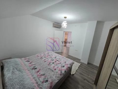 Bedroom with a double bed and wardrobe. - image 8