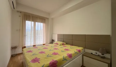 Bedroom with a double bed and access to the terrace. - image 5