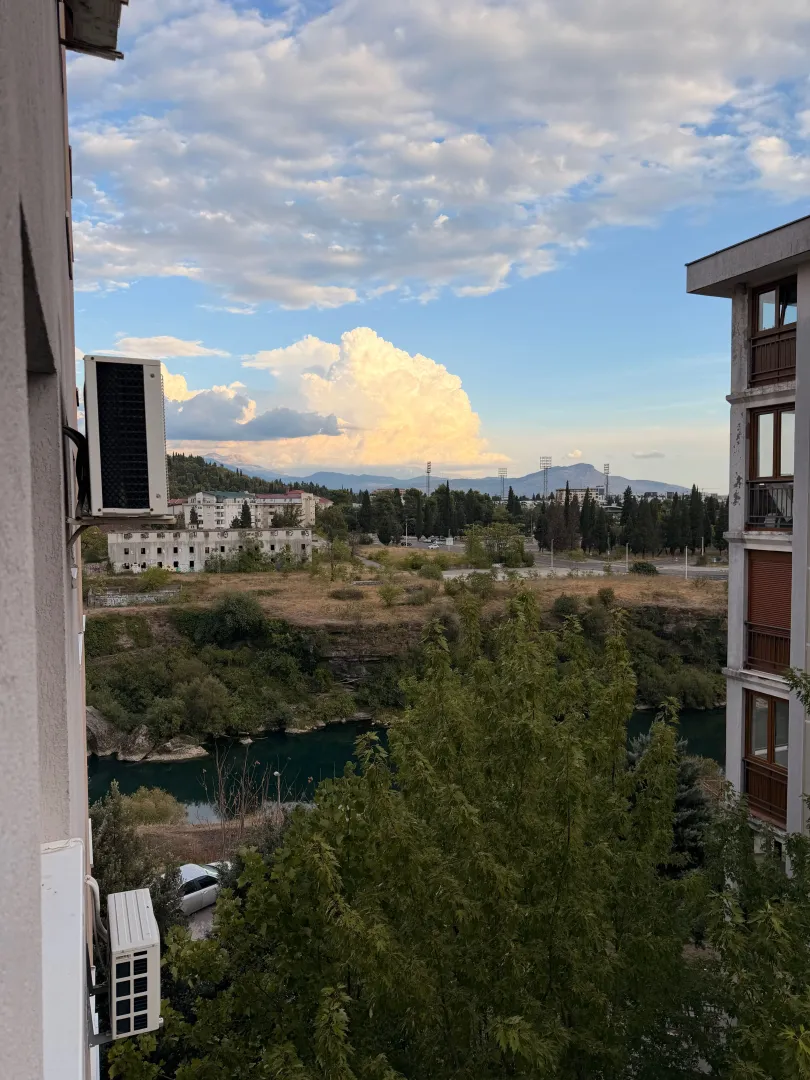 View from the terrace overlooking the city, river, and landscape.
