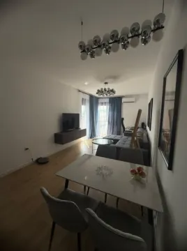Dnevni boravak sa trpezarijom, garniturom i TV-om. - image 3