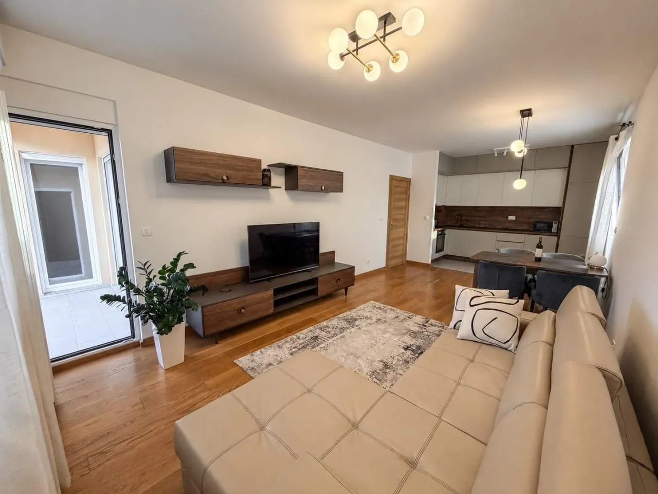 Spacious living room connected to the kitchen and dining area.