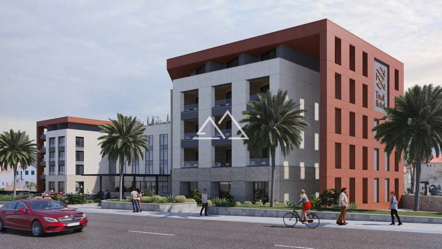 Spoljašnji izgled moderne hotelske zgrade sa uređenim okruženjem i palmama.
