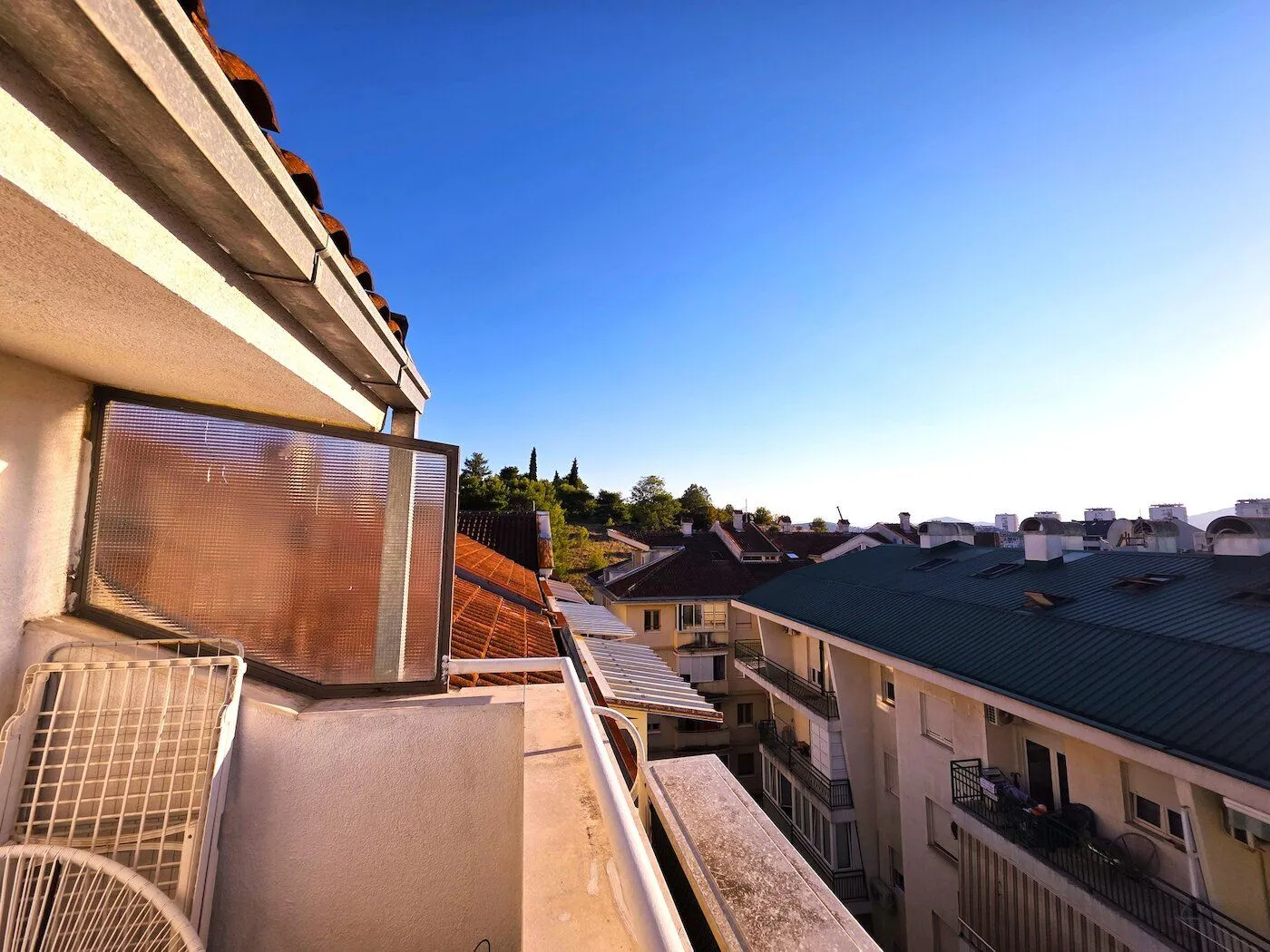 View from the terrace overlooking surrounding buildings and the neighborhood.