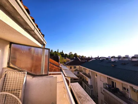 View from the terrace overlooking surrounding buildings and the neighborhood. - image 18