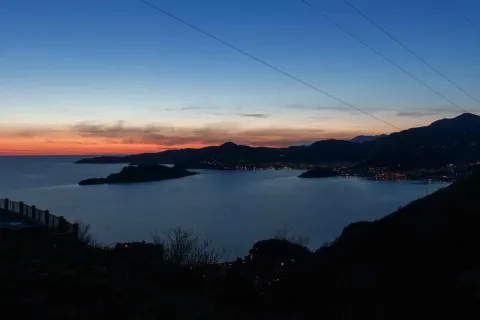 View of the bay and city at dusk from the terrace. - image 18