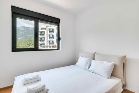 Bright bedroom with a double bed and a view through the window. - image 14