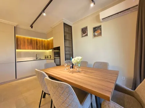 Kitchen with dining table and chairs. - image 8