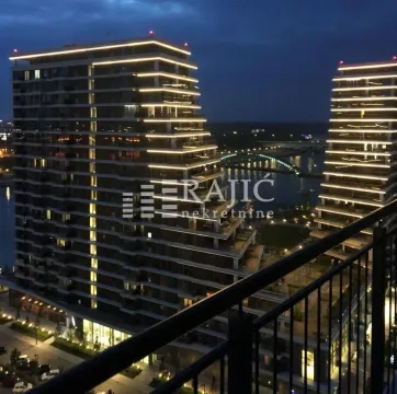 View from the terrace of modern buildings and the city at dusk. - image 13